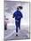 Woman Running During a Snow Storm-null-Mounted Photographic Print