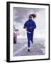 Woman Running During a Snow Storm-null-Framed Photographic Print