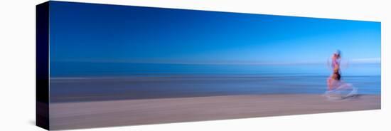 Woman Running on the Beach-null-Stretched Canvas