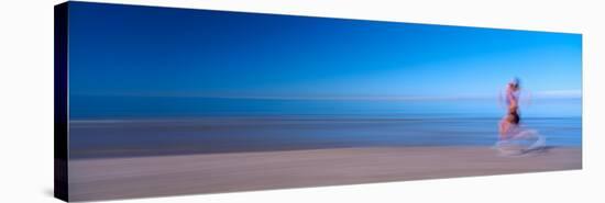 Woman Running on the Beach-null-Stretched Canvas