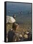 Woman's Back Covered with Mud and People Floating in the Sea in Background, Dead Sea, Israel-Eitan Simanor-Framed Stretched Canvas