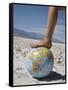 Woman's Foot on Globe, Bad Waters Point, Death Valley National Park, California, USA-Angelo Cavalli-Framed Stretched Canvas