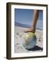 Woman's Foot on Globe, Bad Waters Point, Death Valley National Park, California, USA-Angelo Cavalli-Framed Photographic Print