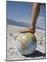 Woman's Foot on Globe, Bad Waters Point, Death Valley National Park, California, USA-Angelo Cavalli-Mounted Photographic Print