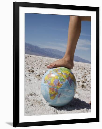 Woman's Foot on Globe, Bad Waters Point, Death Valley National Park, California, USA-Angelo Cavalli-Framed Photographic Print