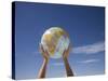 Woman's Hands Holding Globe, Death Valley National Park, California-Angelo Cavalli-Stretched Canvas