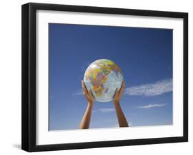 Woman's Hands Holding Globe, Death Valley National Park, California-Angelo Cavalli-Framed Photographic Print