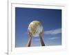 Woman's Hands Holding Globe, Death Valley National Park, California-Angelo Cavalli-Framed Photographic Print