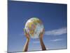 Woman's Hands Holding Globe, Death Valley National Park, California-Angelo Cavalli-Mounted Photographic Print