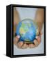 Woman's Hands Holding World Globe-Angelo Cavalli-Framed Stretched Canvas