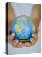 Woman's Hands Holding World Globe-Angelo Cavalli-Stretched Canvas
