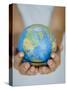 Woman's Hands Holding World Globe-Angelo Cavalli-Stretched Canvas