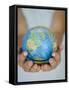 Woman's Hands Holding World Globe-Angelo Cavalli-Framed Stretched Canvas