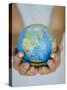 Woman's Hands Holding World Globe-Angelo Cavalli-Stretched Canvas