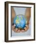 Woman's Hands Holding World Globe-Angelo Cavalli-Framed Photographic Print