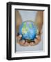 Woman's Hands Holding World Globe-Angelo Cavalli-Framed Photographic Print