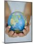 Woman's Hands Holding World Globe-Angelo Cavalli-Mounted Photographic Print