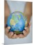 Woman's Hands Holding World Globe-Angelo Cavalli-Mounted Photographic Print