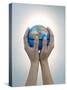 Woman's Hands Holding World Globe-Angelo Cavalli-Stretched Canvas