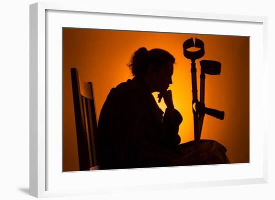 Woman Seated with Crutches-Anthony West-Framed Photographic Print