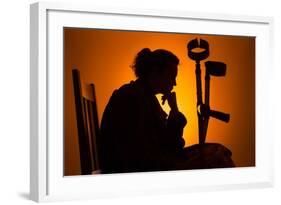 Woman Seated with Crutches-Anthony West-Framed Photographic Print