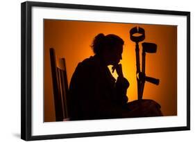 Woman Seated with Crutches-Anthony West-Framed Photographic Print