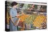 Woman Shopping at Grocery Store-William P. Gottlieb-Stretched Canvas