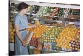 Woman Shopping at Grocery Store-William P. Gottlieb-Stretched Canvas