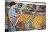 Woman Shopping at Grocery Store-William P. Gottlieb-Mounted Photographic Print