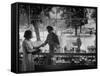 Woman Shopping For Cosmetics-Alfred Eisenstaedt-Framed Stretched Canvas