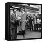 Woman Shopping in Brooks Brothers Wearing Men's Tweed Topcoat-Nina Leen-Framed Stretched Canvas