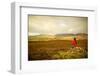 Woman Sit on a Pile of Stones and Look at the Mountains from Cairngorms in Scotland-pink candy-Framed Photographic Print