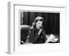 Woman Sits with Her Pen in Her Mouth Whilst Thinking About What She Should Write in Her Letter-null-Framed Art Print