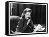 Woman Sits with Her Pen in Her Mouth Whilst Thinking About What She Should Write in Her Letter-null-Framed Stretched Canvas