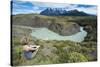 Woman Sitting Above a River Bend in Front of the Torres Del Paine National Park-Michael Runkel-Stretched Canvas