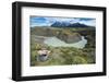 Woman Sitting Above a River Bend in Front of the Torres Del Paine National Park-Michael Runkel-Framed Photographic Print