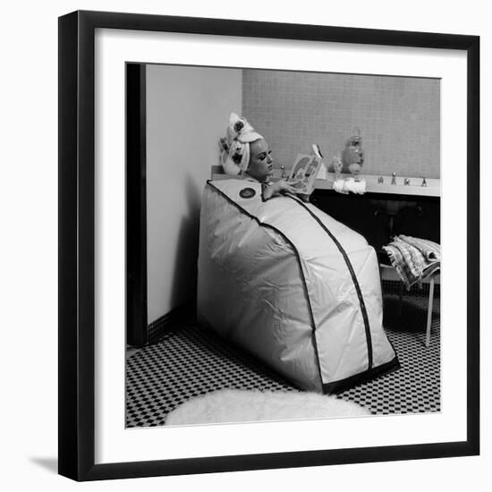 Woman Sitting in a Portable Finnish Sauna Bath-Yale Joel-Framed Photographic Print