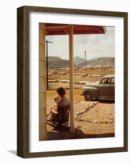 Woman Sitting in Rocking Chair on Veranda Playing with Baby on Her Lap-Andreas Feininger-Framed Photographic Print