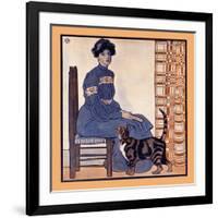 Woman Sitting On A Chair Holding A Book With A Cat Looking On-Edward Penfield-Framed Art Print