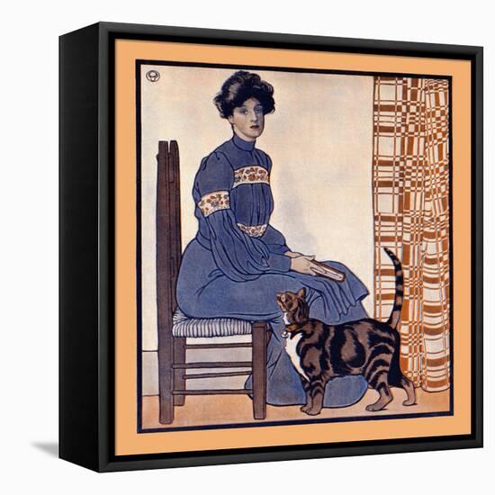 Woman Sitting On A Chair Holding A Book With A Cat Looking On-Edward Penfield-Framed Stretched Canvas