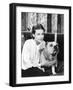 Woman Sitting on a Sofa Holding Her Bulldog-null-Framed Photo