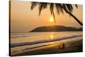 Woman Sitting on Mirissa Beach Watching the Sun Set-Matthew Williams-Ellis-Stretched Canvas