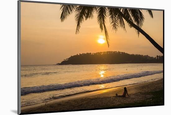 Woman Sitting on Mirissa Beach Watching the Sun Set-Matthew Williams-Ellis-Mounted Photographic Print