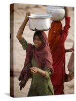 Woman Smiles after Collecting Drinking Water, on the Outskirts of Islamabad, Pakistan-null-Stretched Canvas