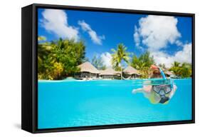 Woman Snorkeling in Clear Tropical Waters in Front of Exotic Island-BlueOrange Studio-Framed Stretched Canvas