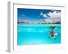 Woman Snorkeling in Clear Tropical Waters in Front of Overwater Villas-BlueOrange Studio-Framed Photographic Print