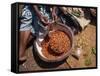 Woman Sorting Chili Peppers in a Metal Bowl, Ghana, West Africa, Africa-Taylor Liba-Framed Stretched Canvas