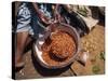 Woman Sorting Chili Peppers in a Metal Bowl, Ghana, West Africa, Africa-Taylor Liba-Stretched Canvas