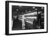 Woman Standing at Long Row of Bobbins, at a Textile Factory-null-Framed Premium Photographic Print