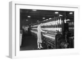 Woman Standing at Long Row of Bobbins, at a Textile Factory-null-Framed Premium Photographic Print